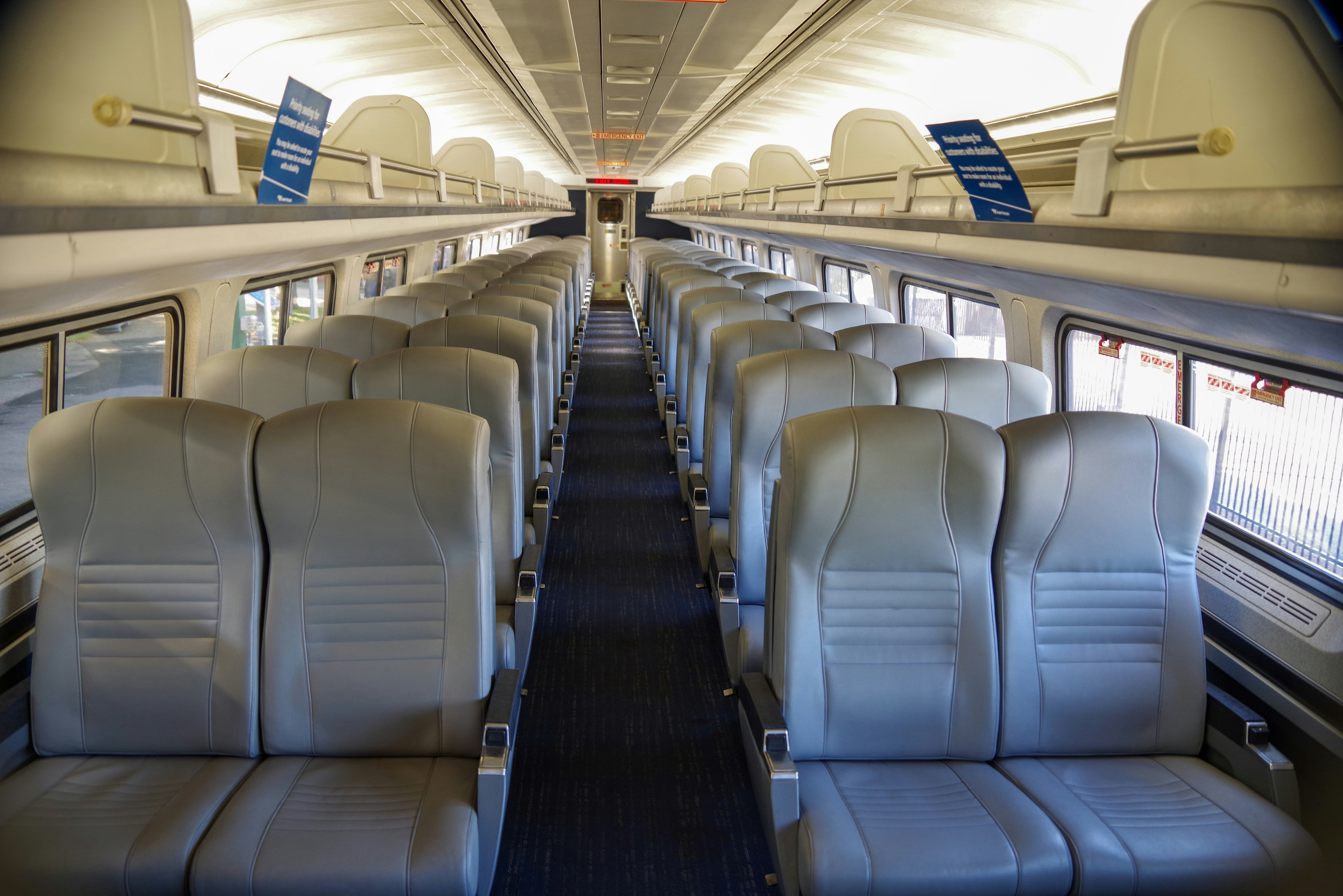 Train Reservation Desk coach class interior with spacious seats
